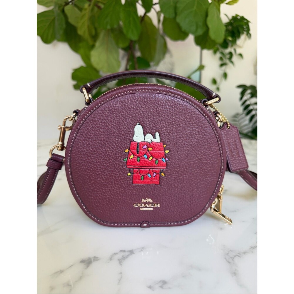 Coach X Peanuts Canteen Round Crossbody With Snoopy Lights Motif Gold Wine CE844